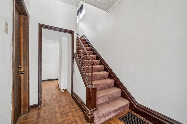 1725 Arlington Ave, South Side, PA 15210 - stairs featuring baseboards and a textured ceiling