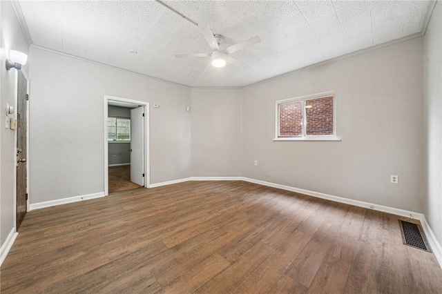 1725 Arlington Ave, South Side, PA 15210 - empty room with a ceiling fan, wood finished floors, crown molding, a textured ceiling, and baseboards