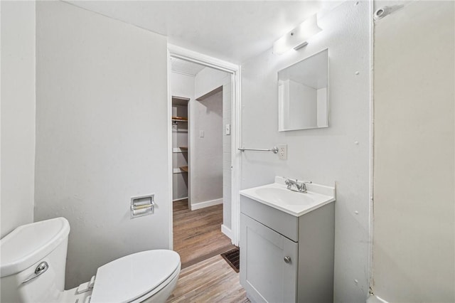 1725 Arlington Ave, South Side, PA 15210 - bathroom featuring toilet, wood finished floors, vanity, and baseboards