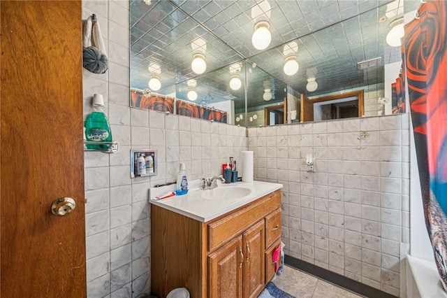 1725 Arlington Ave, South Side, PA 15210 - bathroom featuring tile walls, tile patterned floors, vanity, and a shower with curtain