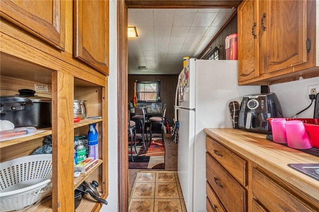 1725 Arlington Ave, South Side, PA 15210 - kitchen featuring brown cabinetry and butcher block counters