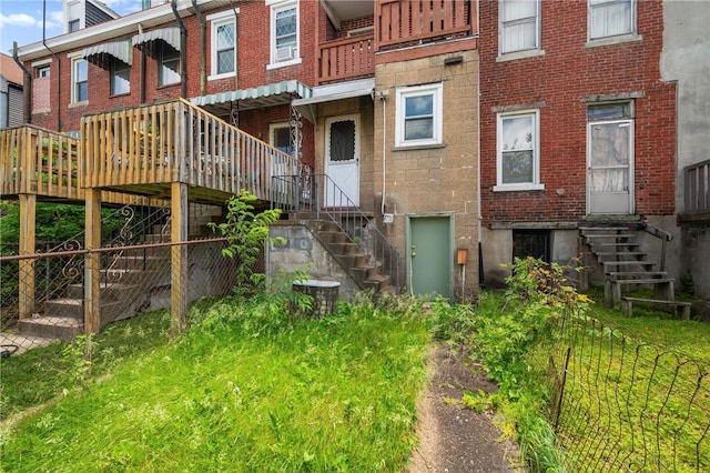 410 Orwell Way, Bloomfield, PA 15224 - rear view of property with stairs and brick siding