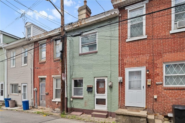 410 Orwell Way, Bloomfield, PA 15224 - view of front facade with brick siding and a chimney