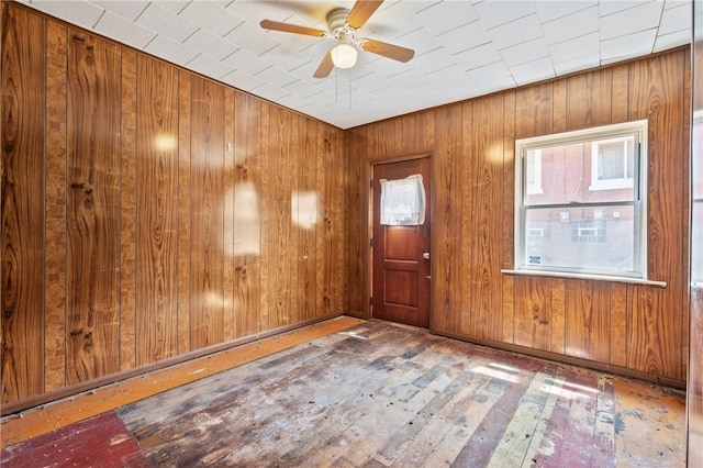 410 Orwell Way, Bloomfield, PA 15224 - entrance foyer featuring a ceiling fan, wood-type flooring, and wooden walls