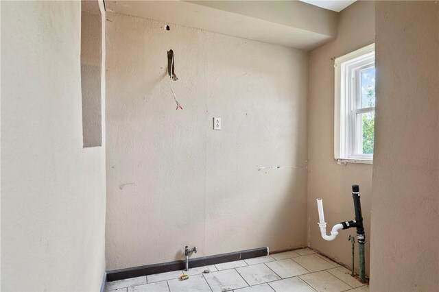 410 Orwell Way, Bloomfield, PA 15224 - laundry room featuring light tile patterned flooring