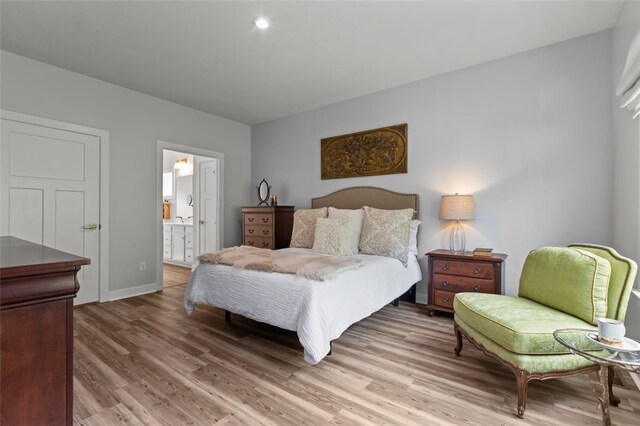 218 St Andrews, North Strabane, PA 15317 - bedroom featuring light wood-style flooring, baseboards, and ensuite bath