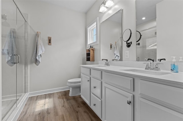 218 St Andrews, North Strabane, PA 15317 - full bathroom with toilet, double vanity, wood finished floors, a shower stall, and baseboards