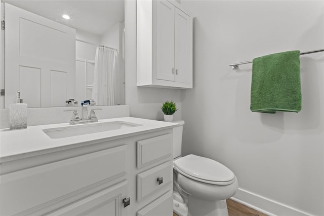 218 St Andrews, North Strabane, PA 15317 - full bath with vanity, toilet, wood finished floors, a shower with curtain, and baseboards