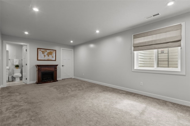 218 St Andrews, North Strabane, PA 15317 - unfurnished living room featuring baseboards, carpet flooring, recessed lighting, and a fireplace