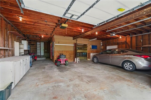 2703 Conway Wallrose Rd, Economy, PA 15005 - garage featuring a garage door opener
