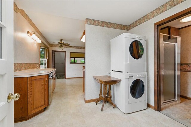 2703 Conway Wallrose Rd, Economy, PA 15005 - washroom featuring stacked washer / drying machine, ceiling fan, and baseboards