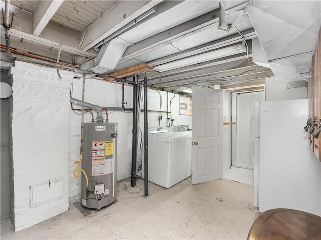 258 Wayne St, Baden, PA 15005 - unfinished below grade area with gas water heater, separate washer and dryer, and freestanding refrigerator