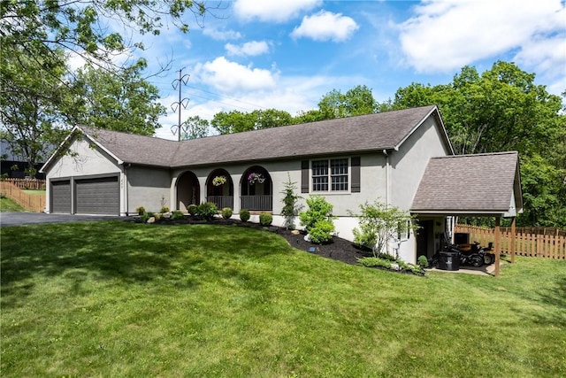 449 Bateman Rd, North Fayette, PA 15071 - ranch-style home featuring stucco siding, a garage, and driveway
