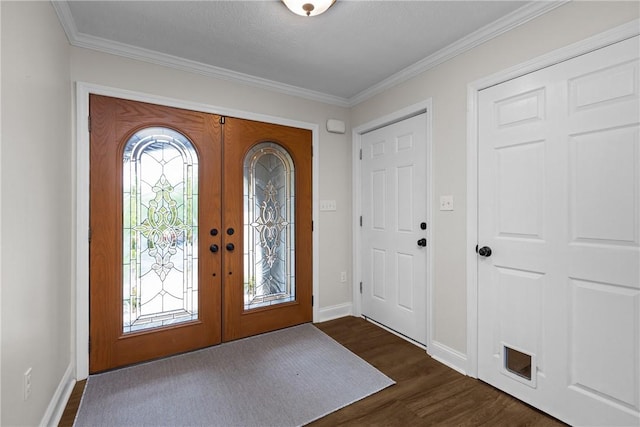 449 Bateman Rd, North Fayette, PA 15071 - foyer entrance featuring dark wood finished floors, french doors, ornamental molding, and baseboards