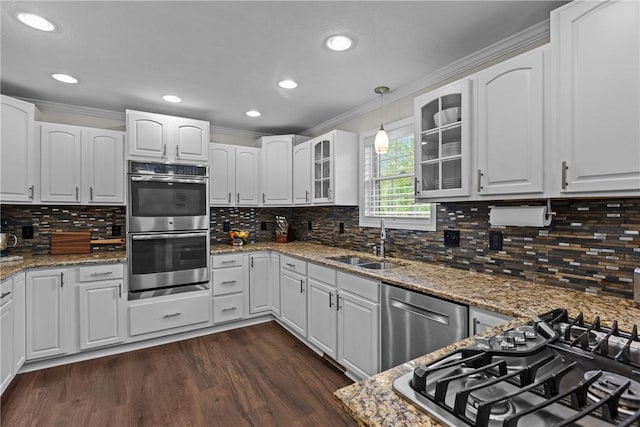 449 Bateman Rd, North Fayette, PA 15071 - kitchen featuring a sink, appliances with stainless steel finishes, glass insert cabinets, ornamental molding, and backsplash