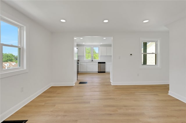 3510 Middletown Rd, Crafton Heights, PA 15204 - unfurnished living room featuring recessed lighting, baseboards, light wood finished floors, and a sink