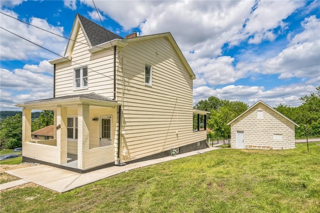 3510 Middletown Rd, Crafton Heights, PA 15204 - view of side of property featuring a chimney, a lawn, a patio area, and a shingled roof