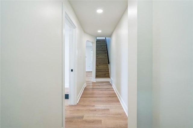 3510 Middletown Rd, Crafton Heights, PA 15204 - hallway featuring arched walkways, recessed lighting, light wood-type flooring, stairway, and baseboards