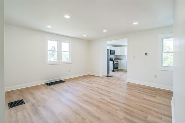 3510 Middletown Rd, Crafton Heights, PA 15204 - unfurnished living room featuring plenty of natural light, light wood finished floors, baseboards, and recessed lighting