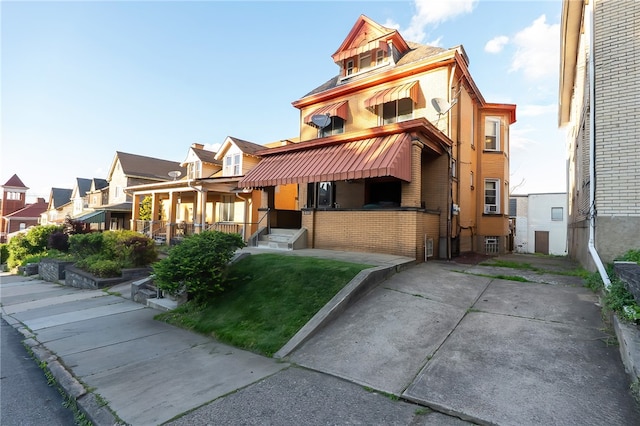 422 Hays Ave, Mount Oliver, PA 15210 - view of front of property with brick siding and a residential view