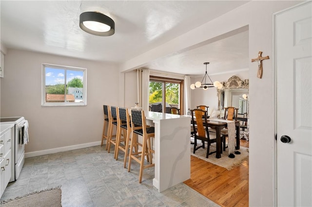 2351 Saranac Ave, Beechview, PA 15216 - dining area with a chandelier and baseboards