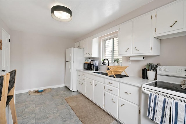 2351 Saranac Ave, Beechview, PA 15216 - kitchen with white appliances, a sink, white cabinetry, and baseboards