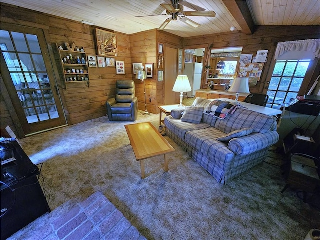235 Mcclay Rd, Canton Twp, PA 15301 - carpeted living area with wooden walls, a ceiling fan, and wooden ceiling with exposed beams