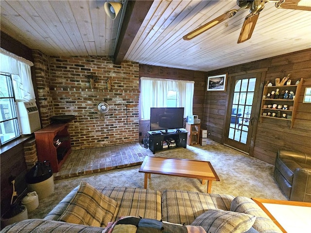 235 Mcclay Rd, Canton Twp, PA 15301 - living room with wooden ceiling, ceiling fan, wood walls, brick wall, and carpet floors