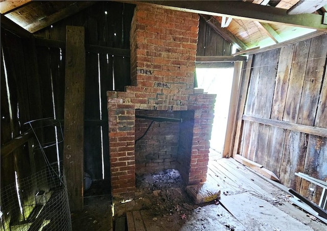 235 Mcclay Rd, Canton Twp, PA 15301 - unfurnished living room with lofted ceiling and wooden walls