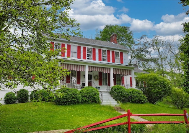 235 Mcclay Rd, Canton Twp, PA 15301 - colonial inspired home featuring a chimney, a porch, and stairs