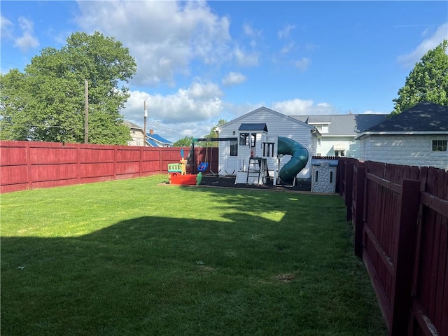 view of yard with a playground