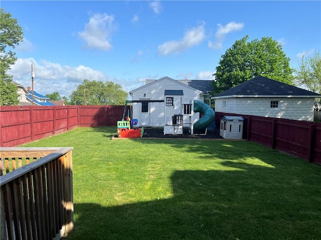 rear view of house with a playground