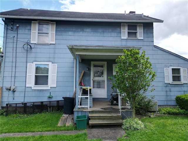 328 3rd St, City Of But Ne, PA 16001 - view of front facade featuring a front lawn