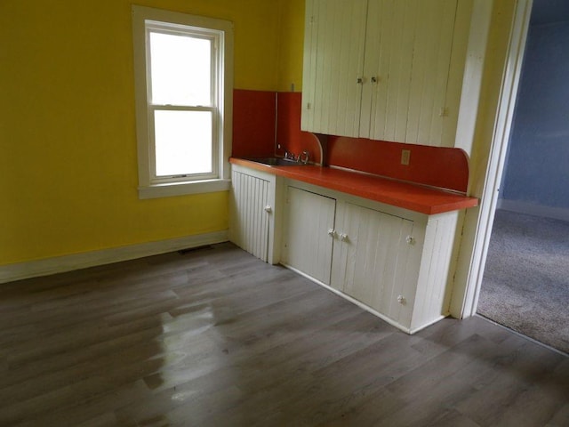 141 Pierce Ave, Sharpsville, PA 16150 - kitchen with baseboards, wood finished floors, and a sink