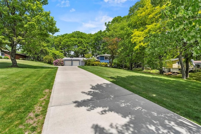 109 Meadowvue Dr, Marshall, PA 15090 - view of front of property featuring a front yard, a garage, and concrete driveway
