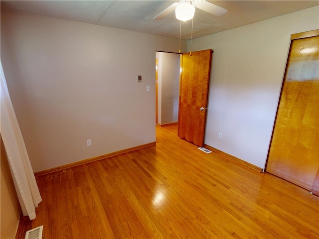 306 Cherokee Dr, Center Twp But, PA 16001 - unfurnished bedroom featuring light wood-type flooring, baseboards, and a ceiling fan