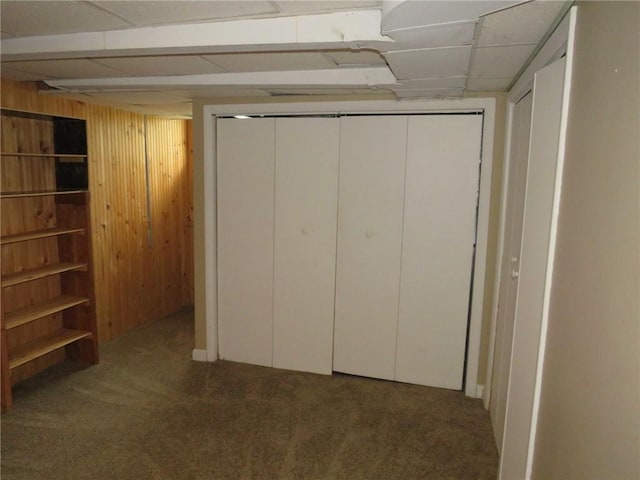985 Mcneilly Rd, Mt Lebanon, PA 15226 - unfurnished bedroom with carpet flooring, wooden walls, and a drop ceiling