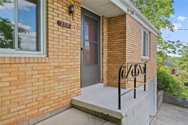 119 Hillcrest Dr, Ross Twp, PA 15237 - doorway to property with brick siding