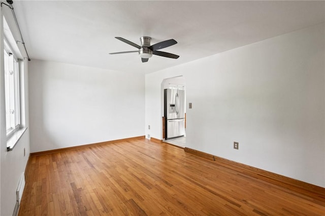 119 Hillcrest Dr, Ross Twp, PA 15237 - empty room featuring ceiling fan, plenty of natural light, light wood-type flooring, and baseboards