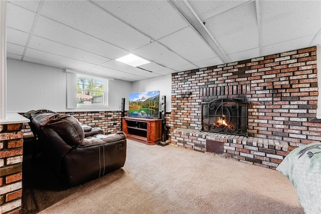 118 Arrow Dr, Elizabeth Twp/Boro, PA 15037 - carpeted living area featuring a drop ceiling and a fireplace