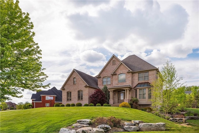 117 Majestic Dr, Adams Twp, PA 16046 - view of front of property with a front yard and brick siding