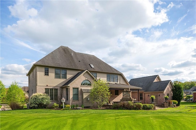 117 Majestic Dr, Adams Twp, PA 16046 - back of house with brick siding and a lawn