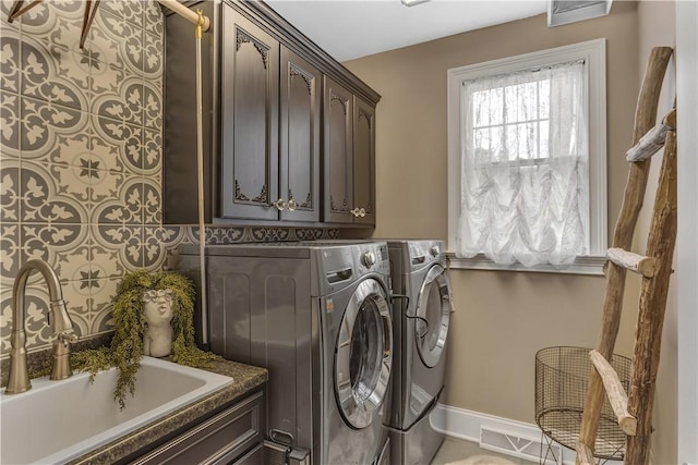 117 Majestic Dr, Adams Twp, PA 16046 - washroom featuring cabinet space, independent washer and dryer, and baseboards