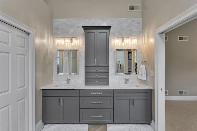 117 Majestic Dr, Adams Twp, PA 16046 - full bathroom featuring backsplash, double vanity, and baseboards
