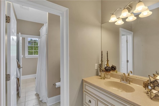 117 Majestic Dr, Adams Twp, PA 16046 - bathroom featuring tile patterned flooring, vanity, and baseboards