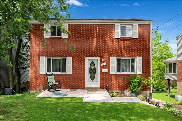 156 Carnation Ave, Ross Twp, PA 15229 - view of front of house featuring a front yard and brick siding