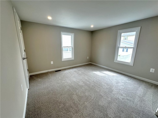 94 Lenox St, Uniontown, PA 15401 - unfurnished room featuring healthy amount of natural light, baseboards, carpet flooring, and recessed lighting