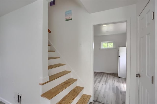622 Ascension Dr, West Mifflin, PA 15122 - staircase featuring wood finished floors and baseboards