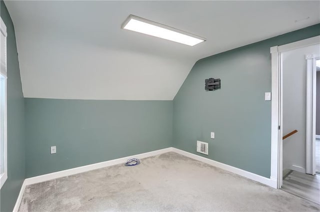 622 Ascension Dr, West Mifflin, PA 15122 - bonus room with lofted ceiling, carpet floors, and baseboards