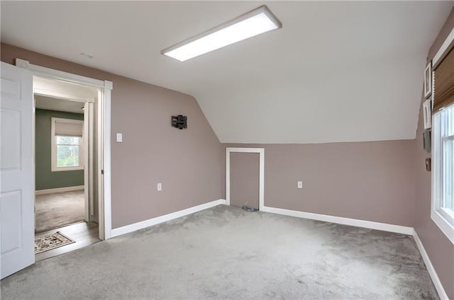 622 Ascension Dr, West Mifflin, PA 15122 - additional living space featuring light carpet, lofted ceiling, and baseboards